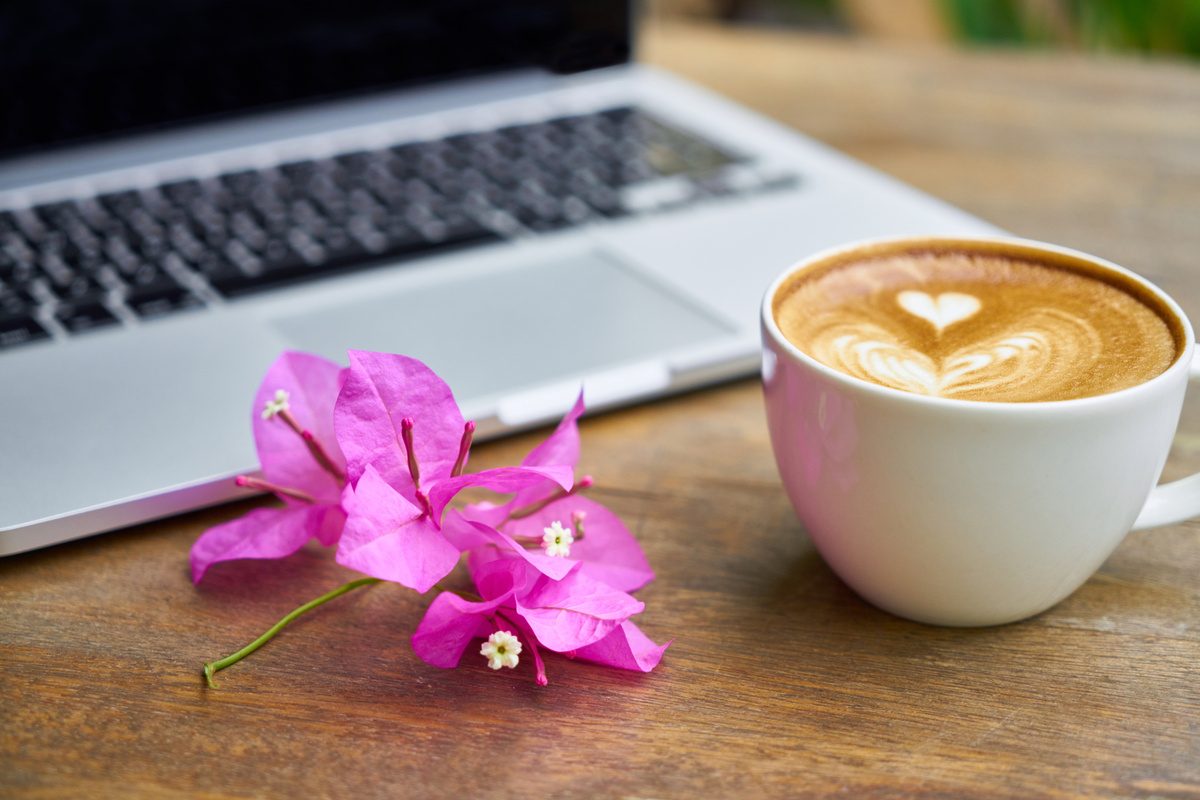 A Laptop and Coffee